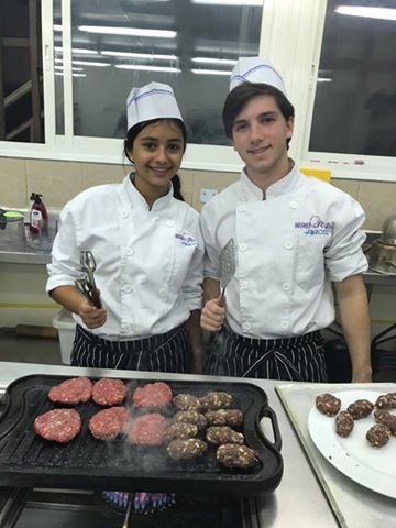 Image may contain: 2 people, people smiling, food